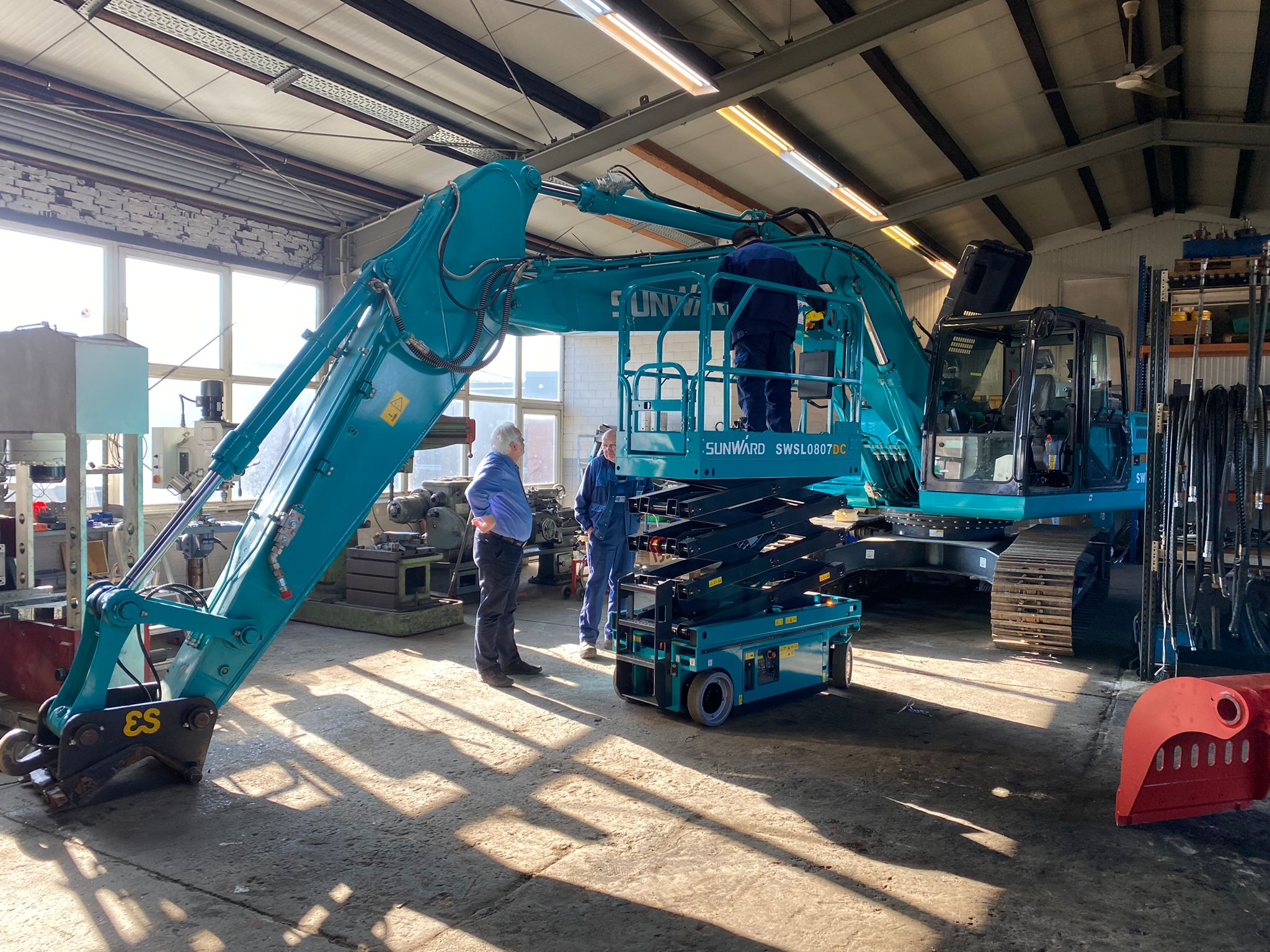 Baumaschinen Reparatur und Anbaugeräte